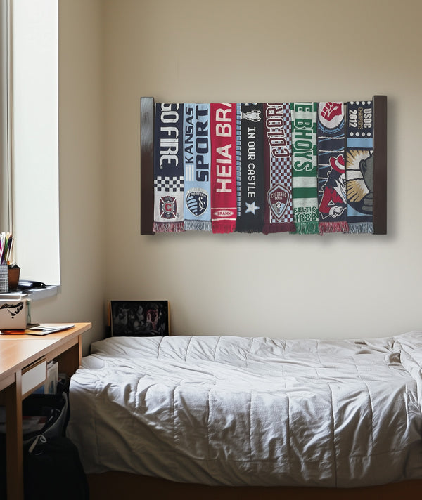 Sports scarf display rack in a clean modern man cave