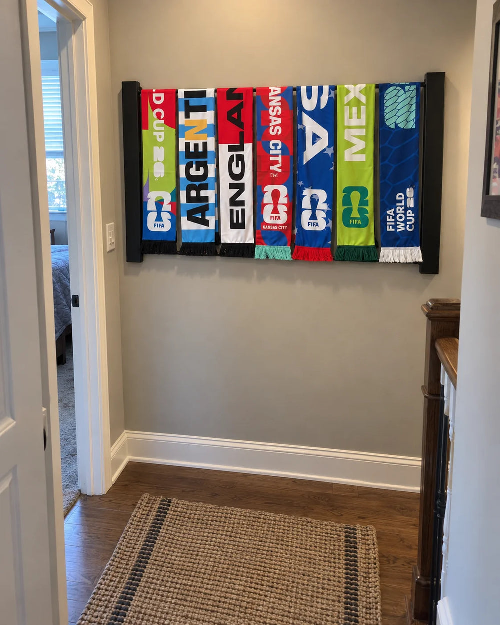 Chorus rack in Black with scarves in a hallway