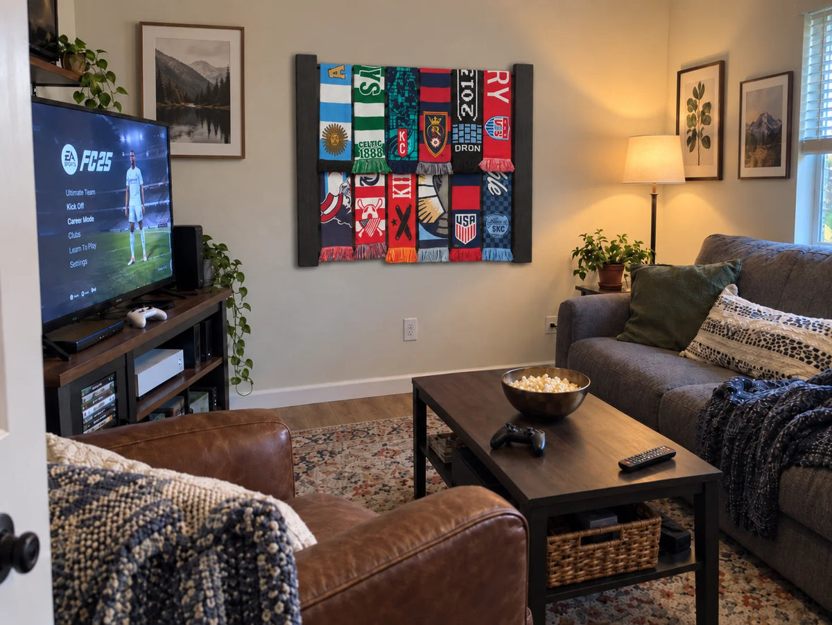 Tribuna rack in Black above a sofa in a den