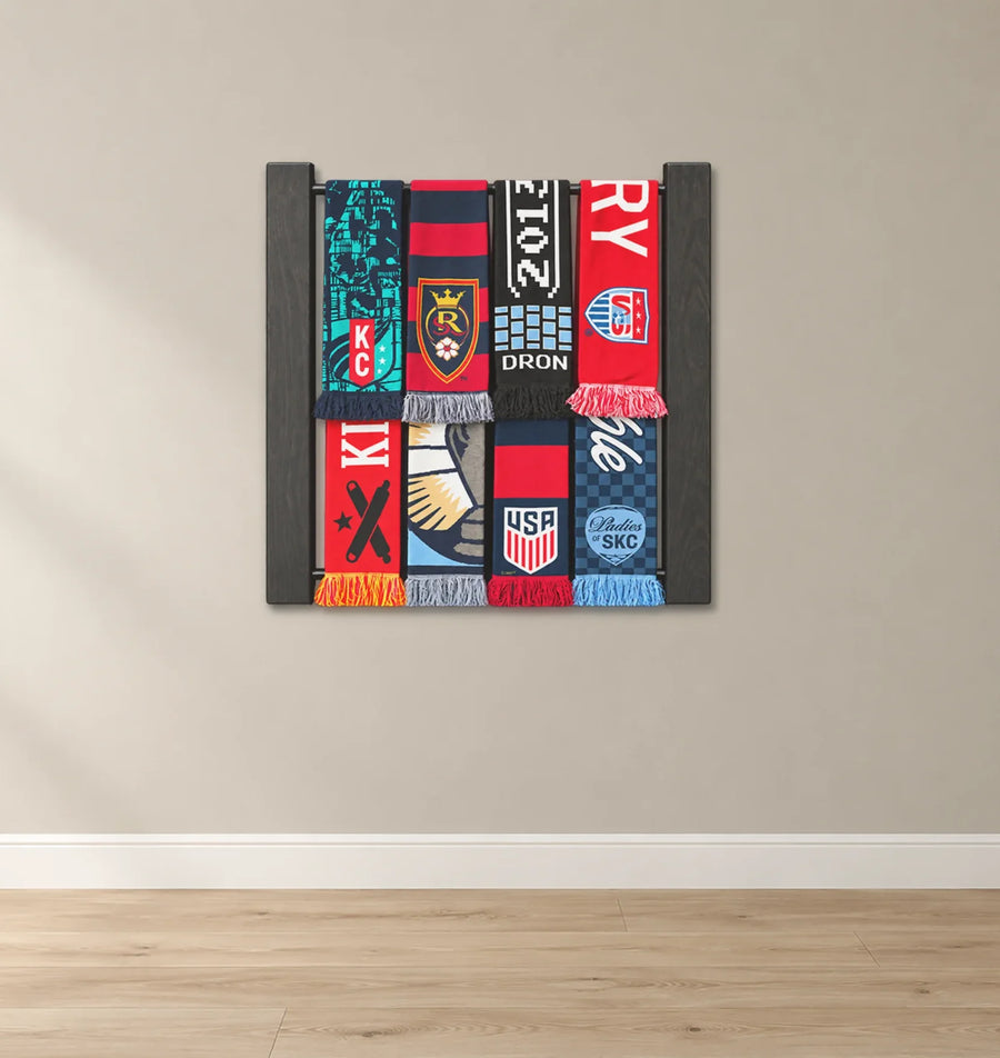 Tribuna 44-inch wall-mounted soccer scarf rack displaying scarves