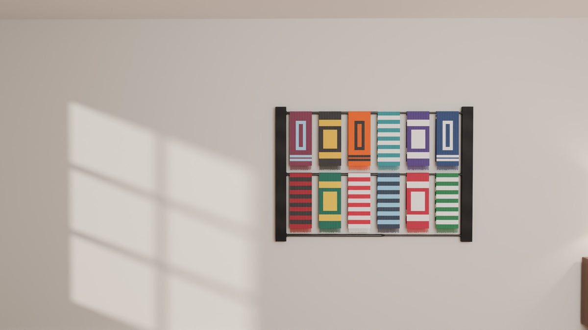 Finished ScarfRacks Terrace rack with two rows of scarves on the wall