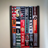 Bernabeu Soccer Scarf Display Rack: Wooden rack with neatly arranged scarves.