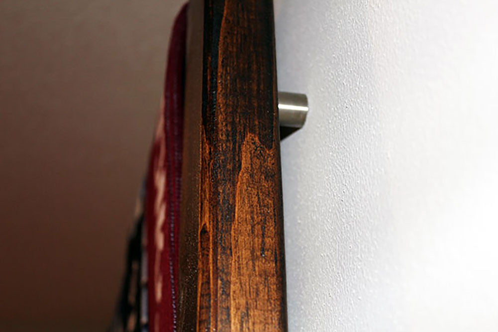 Nou Soccer Scarf Display Rack Close up view a wood  display rack